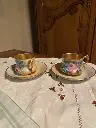 Duo de tasses à café ancienne, avec leur sous-tasses. Limoges France signées.